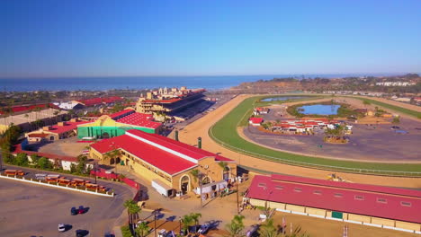Aerial-pan-of-the-Del-Mar-Horsepark-on-a-bright,-sunny-California-day