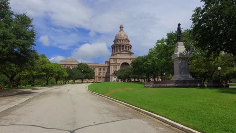 The-Texas-State-Capitol-Building-standing-tall-against-the-blue-Texas-Sky