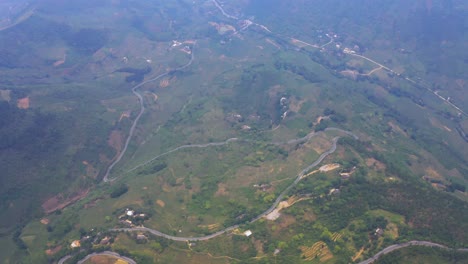 Aerial-pull-back-over-the-misty-mountains-of-northern-Vietnam