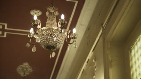 luxury-old-chandelier-in-an-old-mansion-with-camera-movement-5