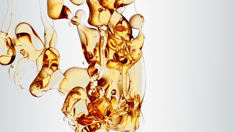 transparent-orange-gold-oil-bubbles-and-fluid-shapes-in-purified-water-on-a-white-gradient-background