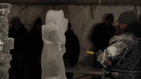 Ice-sculptor-artists-uses-power-tools-to-carve-ice-into-masterpiece