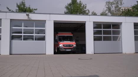 German-emergency-medical-services-respond-to-emergency-alarm-by-driving-out-to-the-location-with-blue-light-and-siren
