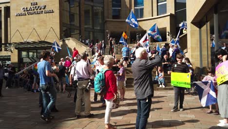 Scottish-Independence-supporters-getting-their-photographs-taking-at-a-rally-against-the-appointment-of-Boris-Johnson-as-the-Uk's-new-Prime-Minister