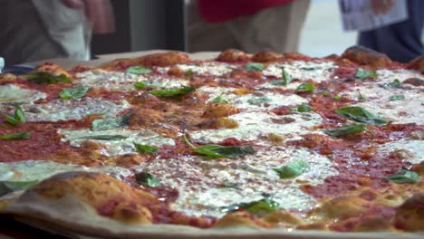 Giant-margarita-pizza-awaiting-being-eaten
