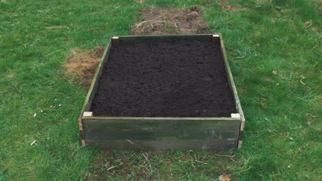 Raised-Garden-Bed-with-compost-jib-crane-shot-4K