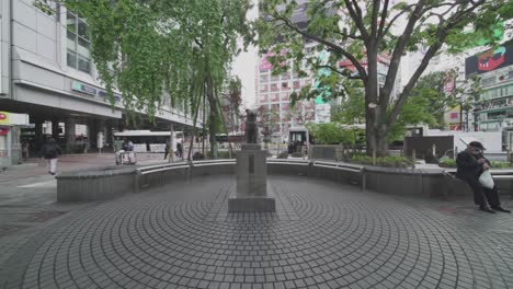 Tokyo,-Japan---Famous-Hachiko-Statue-In-Shibuya-Station-With-No-Tourists-And-Barely-Anyone-Outdoors-Under-World-Lockdown---Coronavirus-Outbreak---Wide-Shot