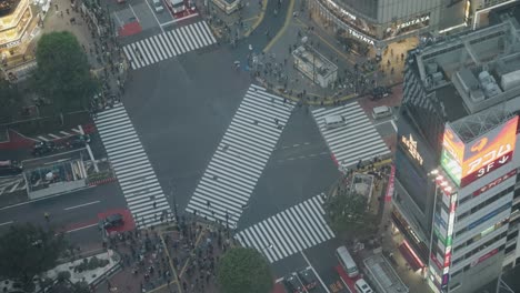 High-Angle-Top-Down-Close-Up-Shot-of-Traffics-and-People-at-the-Shibuya-Crossing
