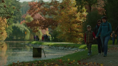 People-enjoying-a-walk-at-Pruhonice-Park-in-the-midst-of-covid-pandemic-lockdown-at-autumn