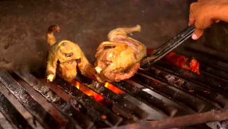 Making-grilled-chicken.-Making-chicken-with-flaming-grill