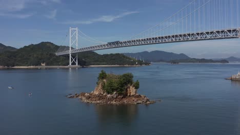 Tilt-reveal-of-Beautiful-Bridge-over-Japans-inland-Sea,-Shimanami-Kaido