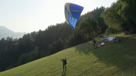 Tracking-paraglider-launching-from-slope.-Slovenj-Gradec.-Slovenia