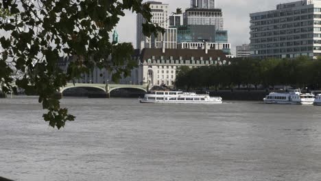 Boat-Moving-Across-River-Thames-Near-Westminster-Bridge