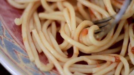 spaghetti-on-a-plate-with-fork-stock-footage