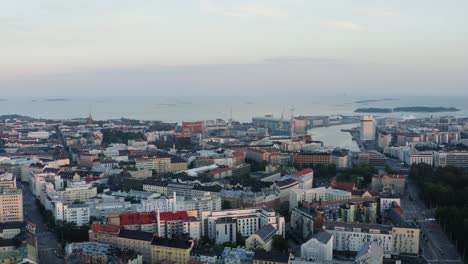 Aerial-Helsinki-coastline-skyline-with-water-and-colorful-buildings