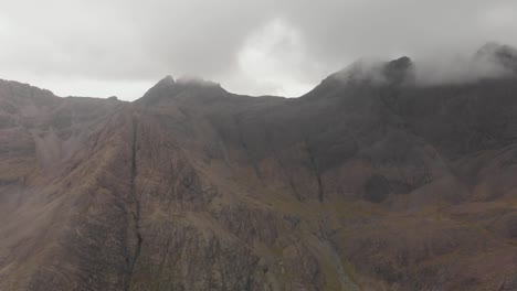 drone-shot-of-majestic-tall-mountains-in-isle-of-skye-scotland