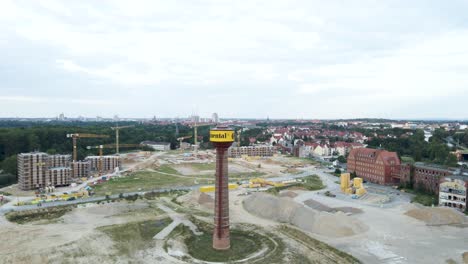 Continental-Tower-on-Industrial-Construction-Site-in-Germany,-Aerial