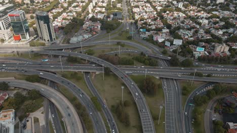 Aerial-orbit-shot-of-Panamericana-highway-interchange-with-traffic-in-Buenos-Aires