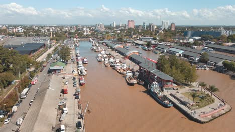 Aerial-establishing-shot-rising-over-Puerto-de-Frutos-in-Tigre-city-near-Buenos-Aires