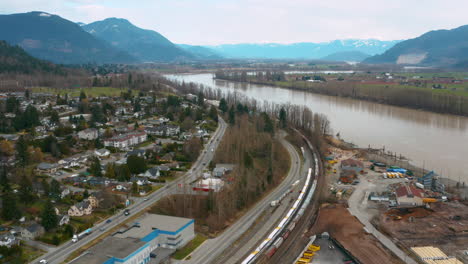 Aerial-view-along-the-Fraser-River-in-scenic-Mission,-British-Columbia