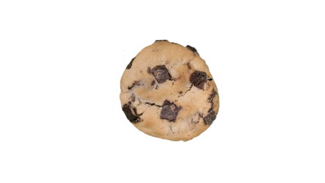Freshly-cooked-chocolate-chip-cookie-spinning-on-white-background-in-top-down-view