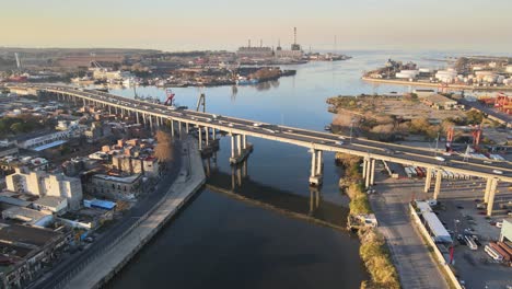 Static-aerial-of-highway-traffic-on-bridge-over-water-in-Buenos-Aires