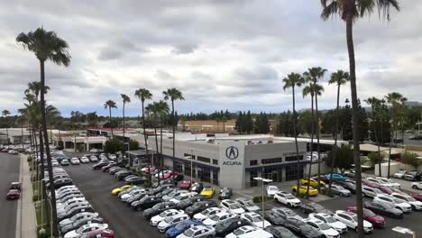 Aerial:-Acura-auto-car-dealership-center-in-Tustin,-Los-Angeles-California