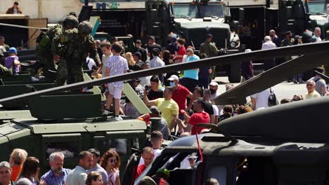 Children-visiting-military-vehicles-and-taking-photos-with-soldiers-in-Tirana-city-square