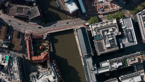 Top-down-drone-shot-over-Central-Bristol-canal-and-construction-site