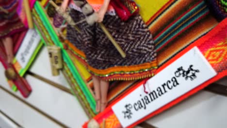 Colorful-Peruvian-Dolls-For-Sale-In-A-Market-In-Cajamarca,-Peru