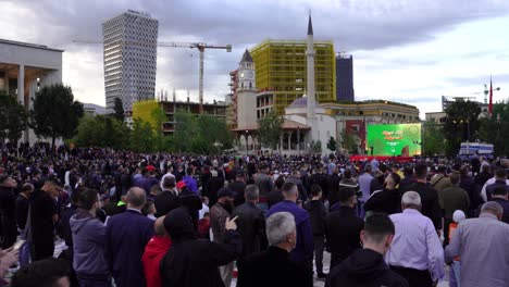 Religious-people-attending-Eid-ceremony-near-mosque-in-Tirana,-Albania