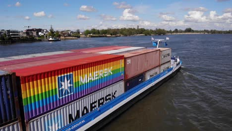 Cargo-Barge-Loaded-With-Intermodal-Containers-Sailing-On-Waterways-Near-Kinderdijk-In-Netherlands