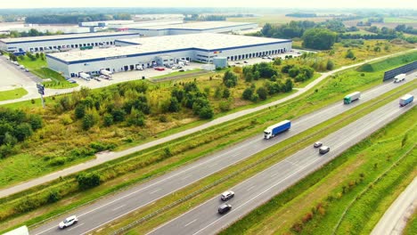 Aerial-view-of-Logistics-center-next-to-the-highway