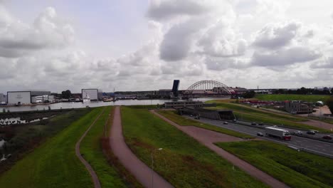 Aerial-Over-A15-Motorway-Ridderkerk-With-Oceanco-Yacht-Factory-And-Marina-In-Background