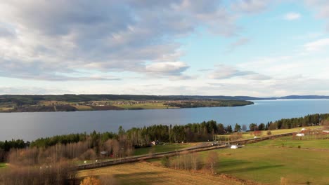 Beautiful-Swedish-Countryside-River-Lake-Town-Farm-Fields-Near-Ã–stersund,-Sweden