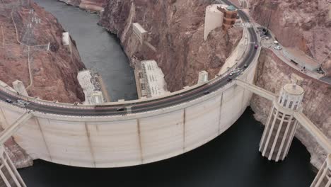 Birds-eye-view-of-the-Hoover-Dam-with-cars-driving-over