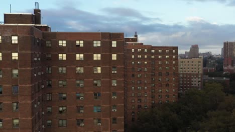 close-aerial-pan-through-housing-project-buildings-in-East-Harlem-New-York-City-in-the-early-morning