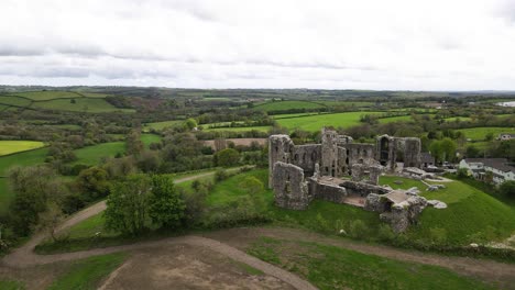Llawhaden-Castle-ruins-in-green-Welsh-countryside-scenery,-Wales-in-UK