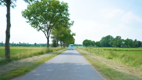View-of-classic-VW-in-countryside-from-vehicle-in-front