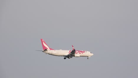 Swoop-airline-an-ultra-low-cost-Canadian-air-carrier,-aircraft-spotted-in-the-sky-in-radius-of-Toronto-Pearson-International-Airport,-Mississauga,-Ontario,-Canada