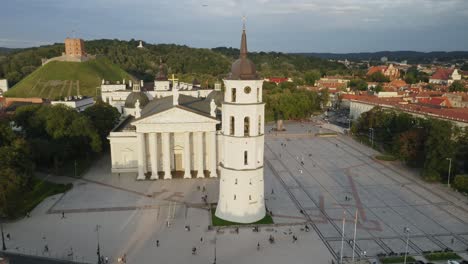 AERIAL:-Vilnius-Cathedral-and-Bell-Tower-in-Summer-with-Gediminas-Hill-in-Background