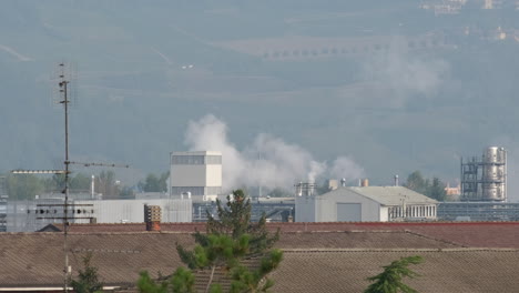 Industrial-factory-pollution,-chemical-smoke-from-chimney,-toxic-gas-steam-in-city