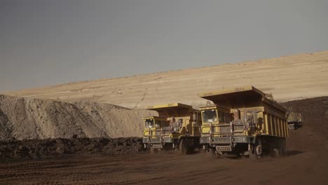 Large-Dump-Trucks-Transporting-Coal-At-Thar-Engro-Opencast-Mine
