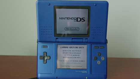 Close-Up-Pan-Right-of-a-Powered-On-Nintendo-DS