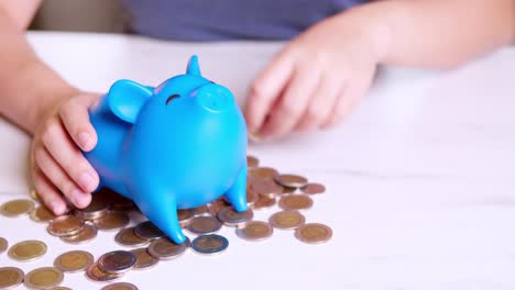 Piggy-Bank-saving-business-standing-on-a-pile-of-coins-concept