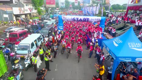 Colorful-starting-location-of-bicycle-marathon-in-Indonesia,-Magelang-city,-aerial-view