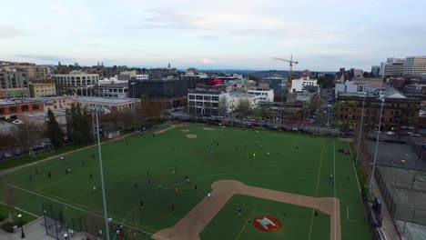 Aerial-shot-flying-overhead-Cal-Anderson's-recreational-sports-fields,-circa-2015