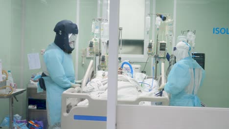Medic-Staffs-Wearing-PPE-While-Working-On-Negative-Pressure-Room-Due-To-Covid-19-Epidemic