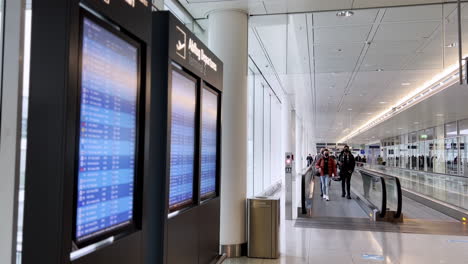 flight-information-display-system-and-passengers-at-munich-airport