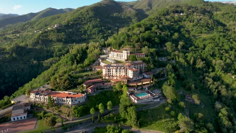 Tuscany-luxury-Resort-hotel-with-pool-in-mountains-drone